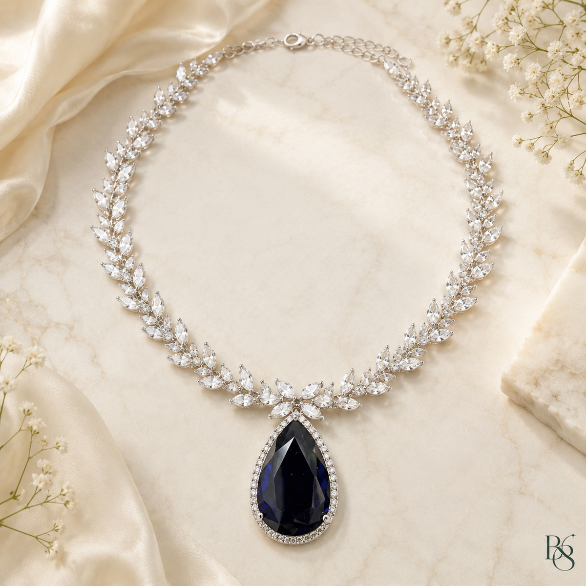 Sapphire teardrop leaf necklace by Bright & Beryl
