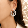 Model wearing Crystal Crescent Hoop Earrings