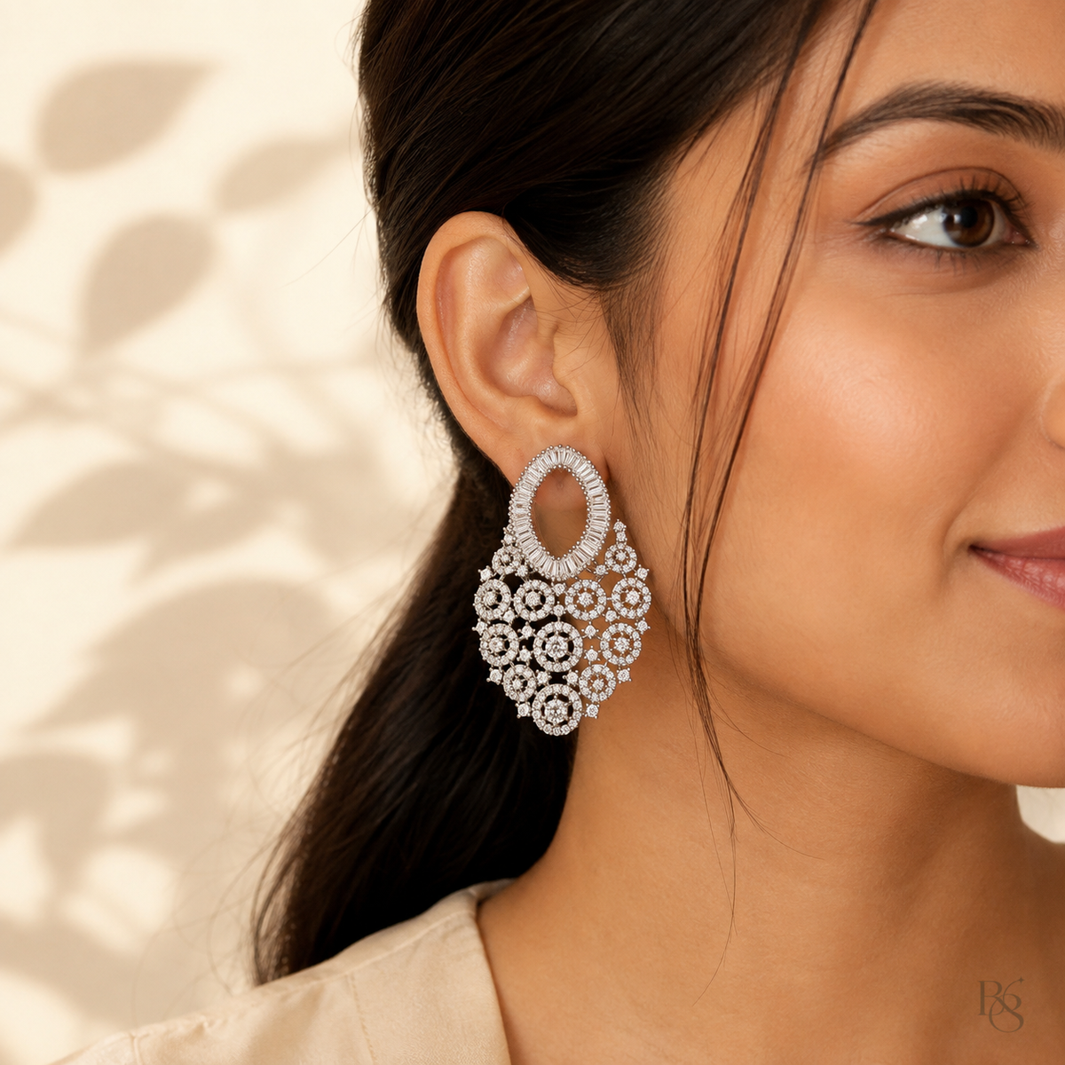 Model wearing Crystal Orbit Chandelier Earrings