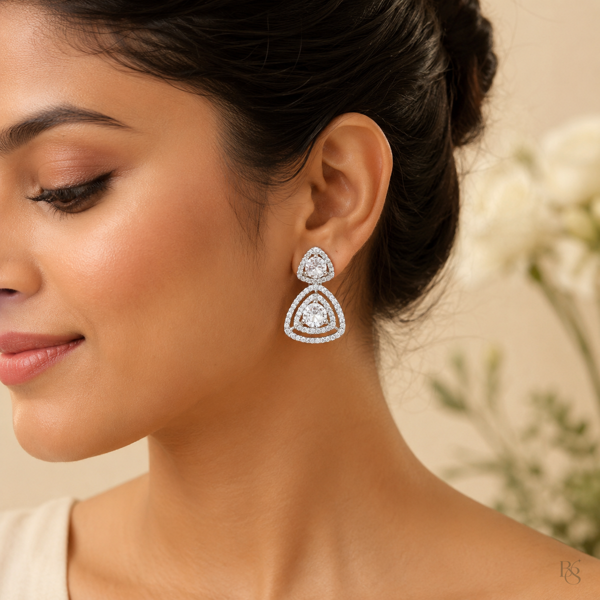 Model wearing Crystal Trillion Halo Drop Earrings