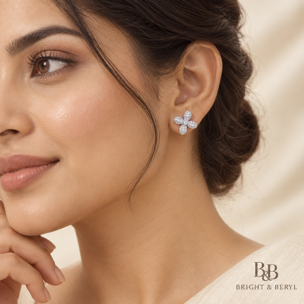 Model wearing Four Petal Pavé Flower Stud Earrings