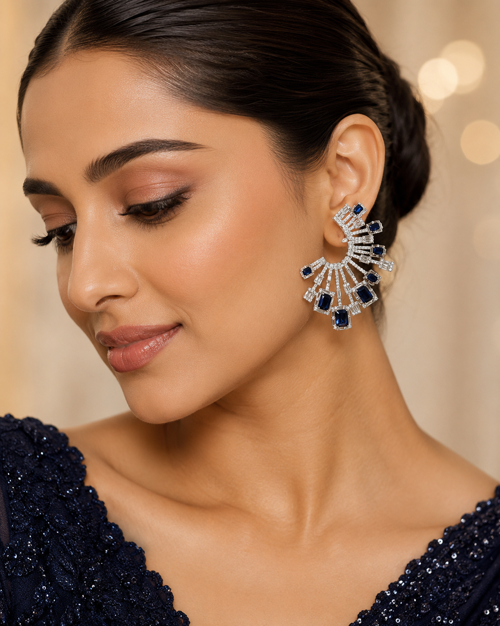 Model wearing Sapphire Fan Statement Earrings in Sapphire Blue