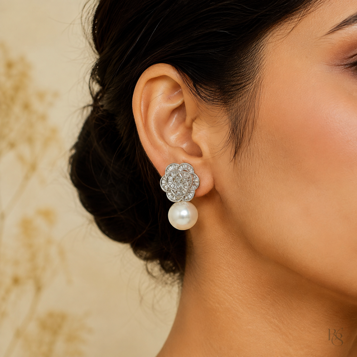 Indian model wearing Silver Rosette Pearl Drop Earrings